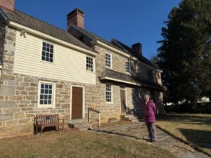 Jenny in front of historical house