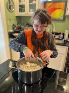 Sarah mashing turnips